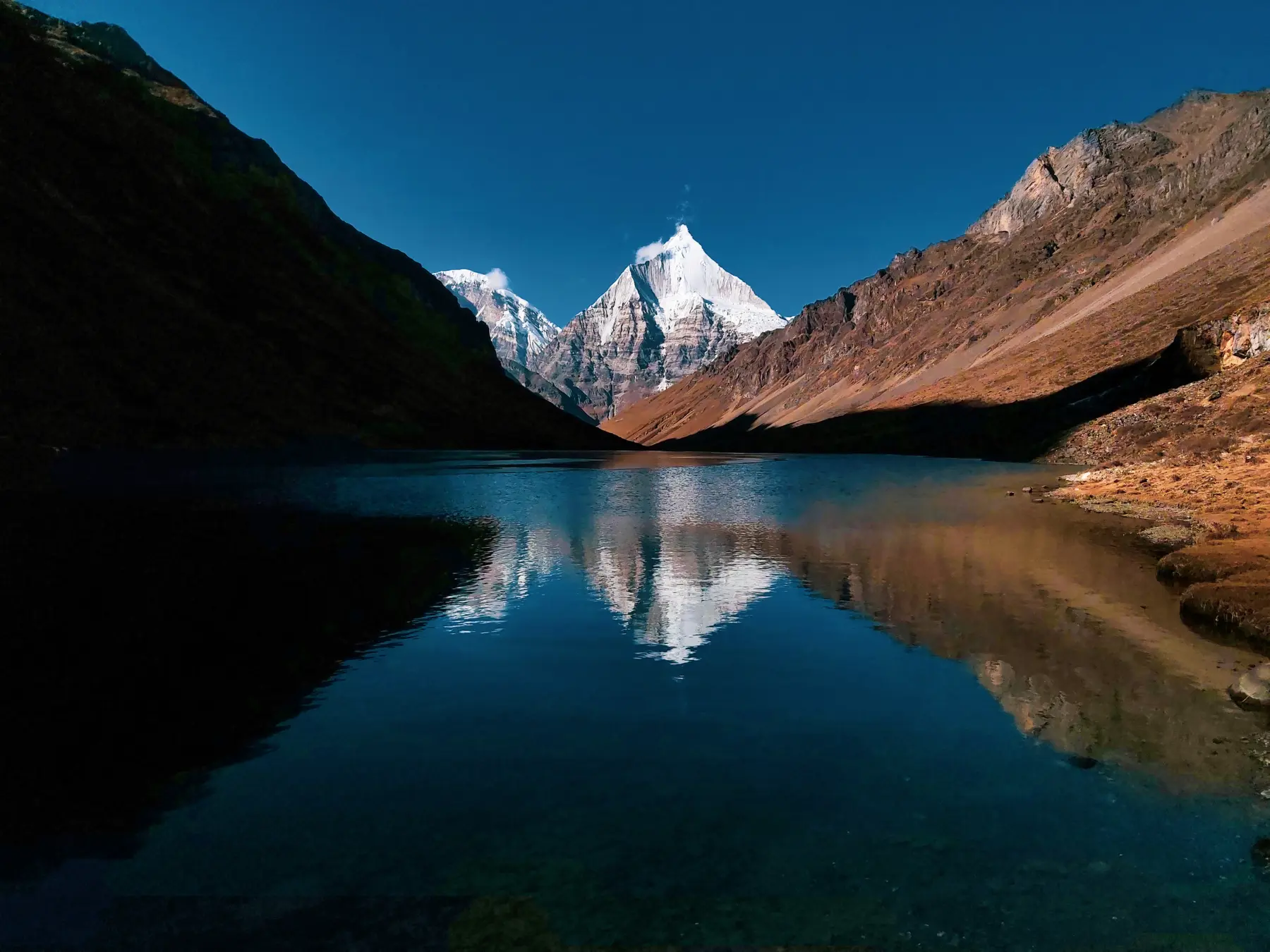 Reflection of Mt. Jichu Drake in Sophu lake